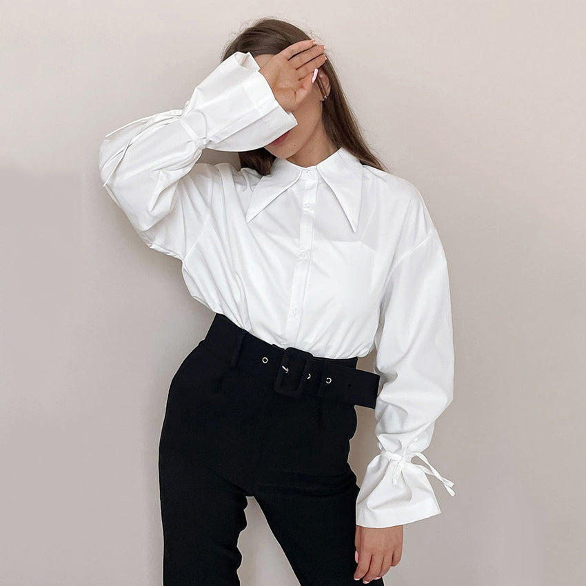 Reveré™ | Bluse med statement-halskjede